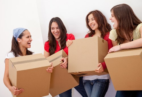 Moving team preparing items inside a removal van in Chiswick