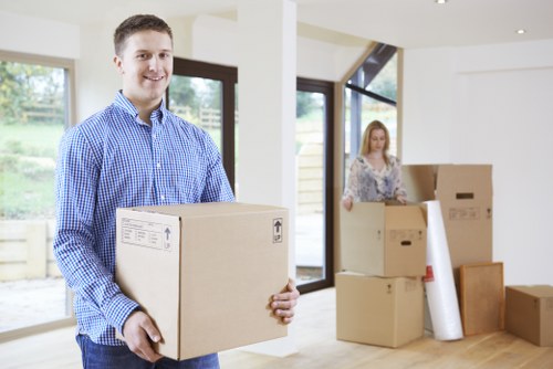 Packed office items and furniture ready for a business move