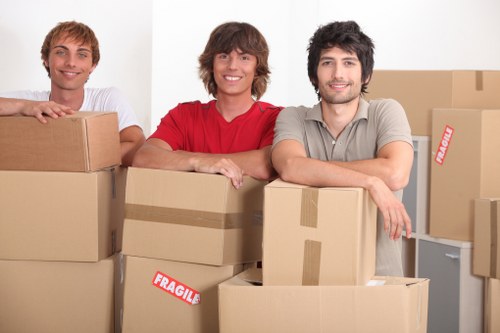 Loading furniture and boxes into a removals van in Chiswick