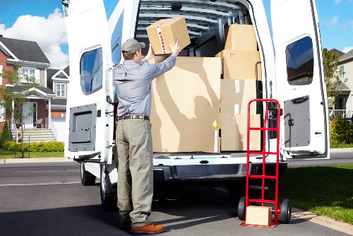 Local removal van service handling access challenges on a west London street