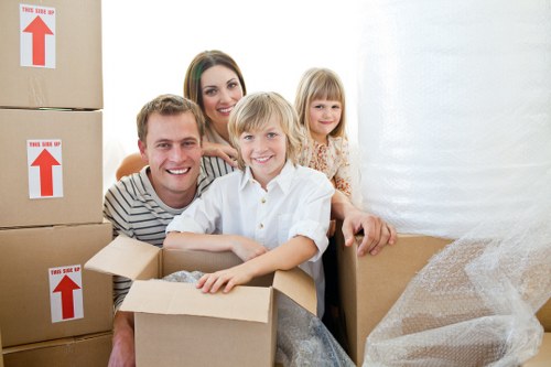 Packed boxes and furniture ready for a local home removal in Chiswick